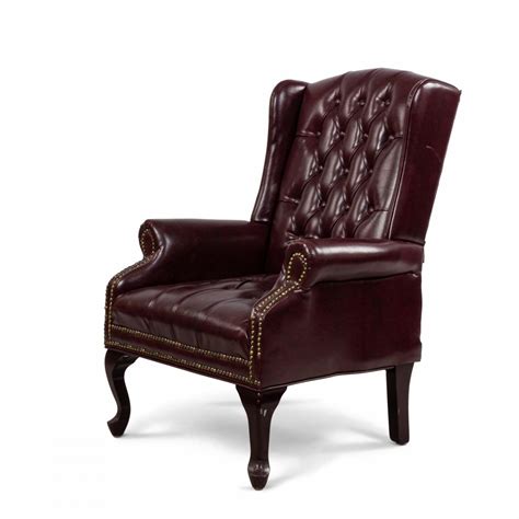 Pair Of Burgundy Tufted Leather Wing Back Chairs