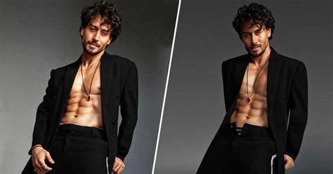 tiger shroff poses with zip open pants flaunting his washboard abs and chiseled jawline hey siri
