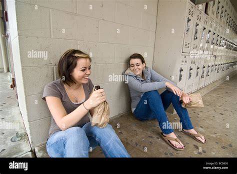 Twins Girls Getting Drunk Drinking Alcohol At Their High School Stock