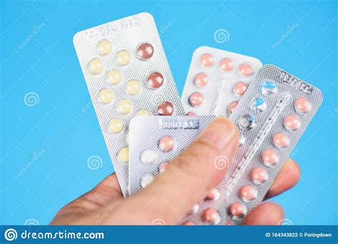 contraception methods concept woman holding contraception pills birth control contraceptive