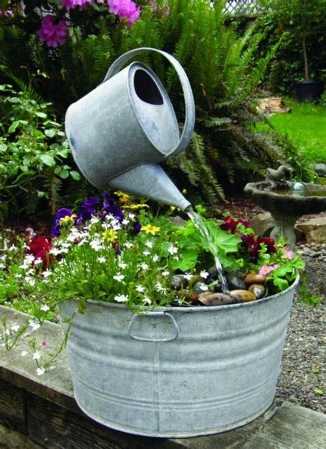 Watering Can Fountain With Plants In Old Galvanized Tub Brunnen