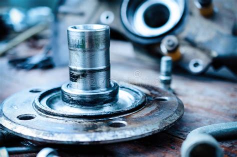Old Oiled Wheel Hub Lies On A Wooden Table Stock Image Image Of