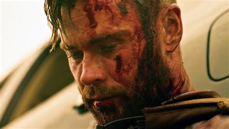 Chris hemsworth haircut extraction called. Extraction's opening scene was originally different