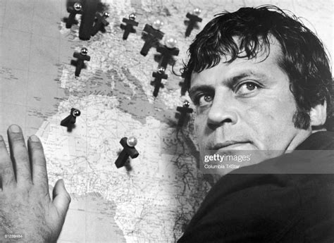 1975 Closeup Of English Actor Oliver Reed Leaning Against A Map In A