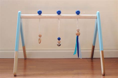 3 Beautiful Fun Wooden Baby Play Gyms Cool Mom Picks