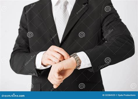 Man Looking At Wristwatch Stock Image Image Of Appointment 32284525