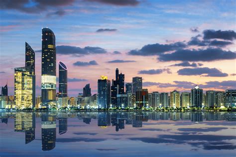 View Of Abu Dhabi Skyline At Sunset Emerging Europe