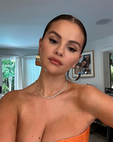 Selena Gomez Busts Out Of Orange Corset And Leaves Fans Stunned With