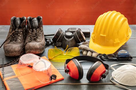 Work Safety Protection Equipment Industrial Protective Gear On Wooden
