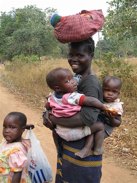 Woman Carrying Blanket And Babies Mother Child African Babies Baby