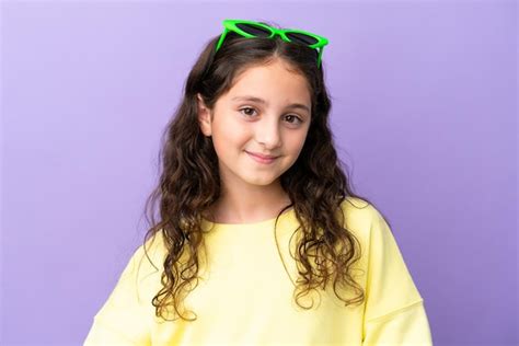 Premium Photo Little Caucasian Girl Isolated On Purple Background