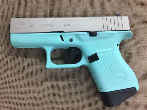 Semis , revolvers, polymer, stainless, chargers. Glock 43 9mm subcompact Tiffany blue frame with silver ...