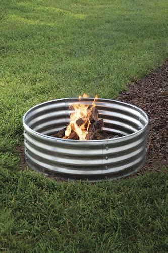This fire pit is constructed from belgian blocks, which . Backyard Creations® 36" Galvanized Steel Fire Ring ...