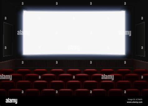 Interior Of A Cinema Movie Theatre With Shiny White Blank Screen Red