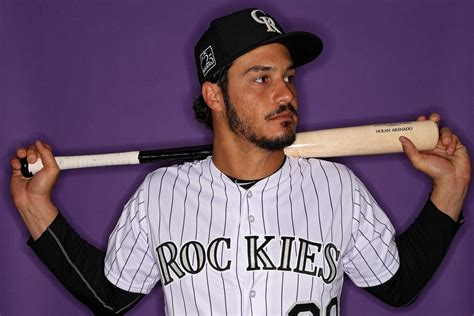 How does nolan arenado compare to other hitters? Nolan Arenado Photos Photos: Colorado Rockies Photo Day ...