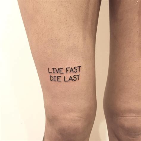 Phrase ‘live Fast Die Last Inked On The Right Leg Above The Knee