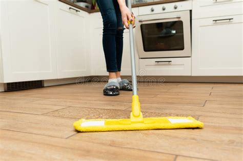 Worth Housewife Cleaning Floor At Home Lovely Woman Washes Wooden Floors From A Laminate In A