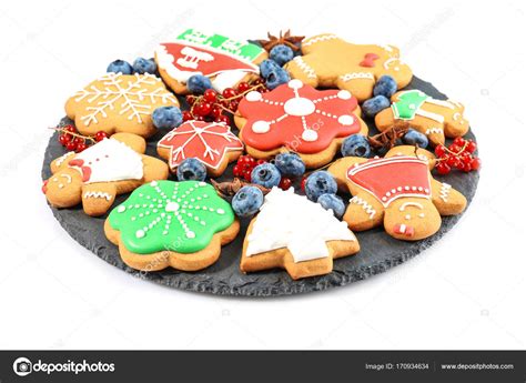 Plate With Delicious Christmas Cookies On White Background Stock Photo