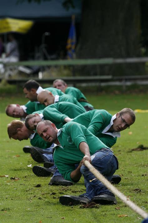 Group Mens Playing Tug War Dew Tug Of War Drag Men Competition