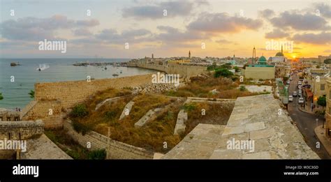 Panoramic Sunset View With Skyline Walls And Fishing Port In The Old