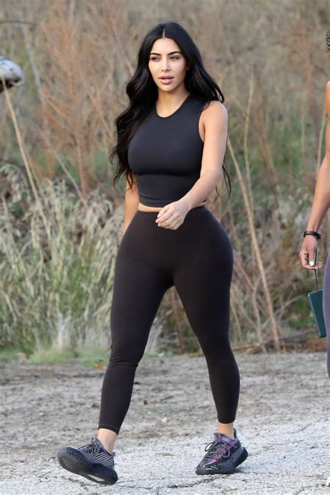 Good photos will be added to photogallery. kim kardashian sports a black crop top and leggings as she ...