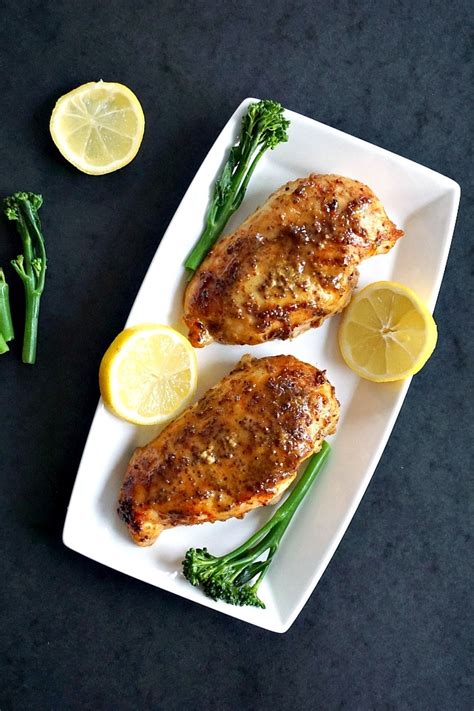 Bake uncovered 20 to 30 minutes longer or until juice of chicken is clear when center of thickest part is cut (170°f). Baked honey mustard chicken breast with a touch of lemon