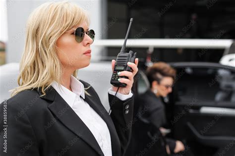 Female Bodyguard Celebbrity Bodyguard And Vip Protection Services Black Suit And Walkie Talkie