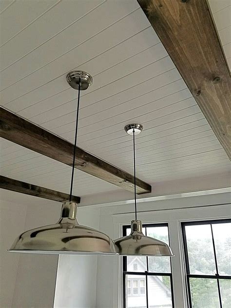 A diy wood plank ceiling project is one of our favorites. Plank ceiling, Lowes lights, DIY Beams | Plank ceiling ...