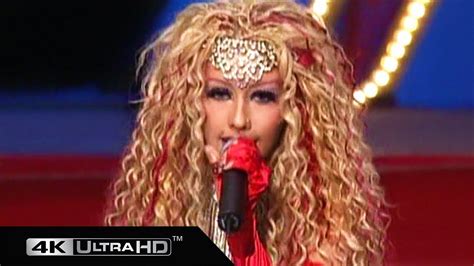 The Red Costume Worn By Christina Aguilera During Her Performance On Lady Marmalade With Lil Kim
