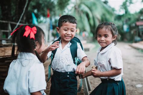 Laos 4000 Islands Area Cheerful Children In School Uniform Standing