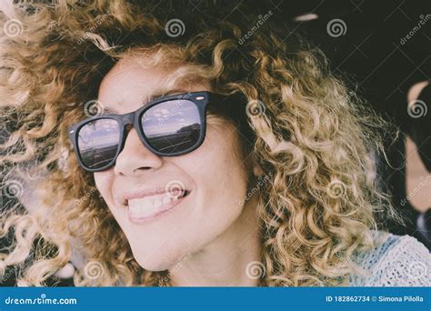 Close Portrait Of Beautiful Young Adult Caucasian Cheerful Happy Woman Smile And Look At The