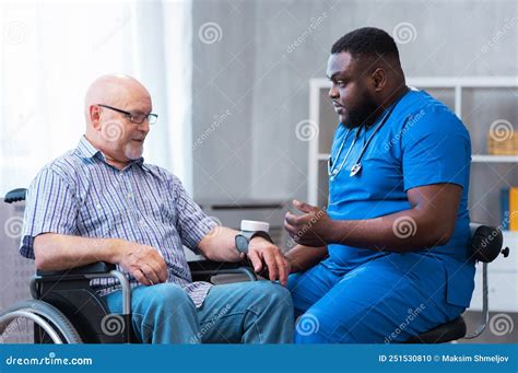 Professional Doctor Helps An Elderly Man With Chronic Diseases