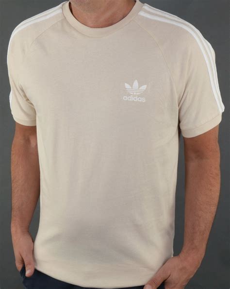The adidas 3 stripe tee debuted in 1973 and became a timeless classic. Adidas Originals 3 Stripes T Shirt Linen,trefoil,tee ...