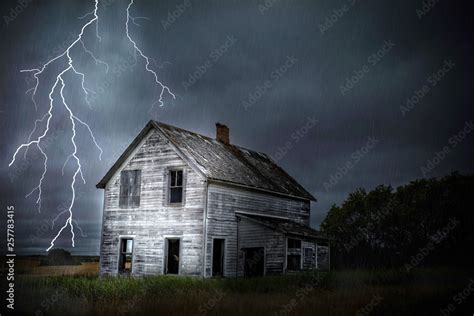 Heavy Lightning And Thunder Storm Close To Abandoned House Stock Photo