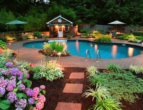 Curb Appeal For A Small Yard Landscapinglife Pool Landscaping Backyard Pool Landscaping