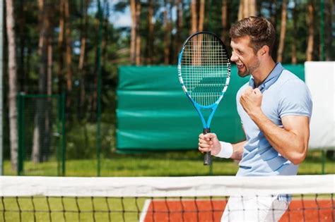 Happy Man Holding Tennis Racket And Gesturing Stock Image Everypixel