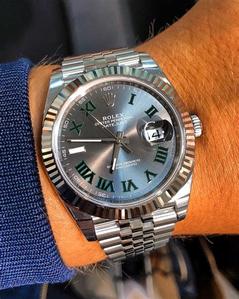 Slate grey wimbledon dial with luminescent hands and green roman numeral hour markers. Rolex Datejust 41 Wimbledon on wrist | Rolex watches ...