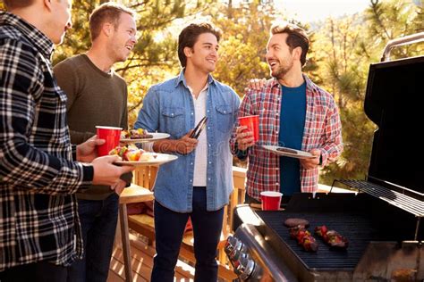 Group Gay Male Friends Enjoying Barbeque Together Stock Photos Free Royalty Free Stock