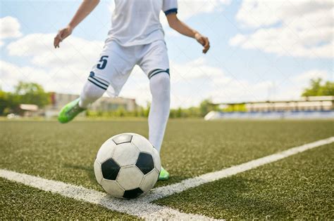 Boy Kicking Ball On Football Field Stock Photos Motion Array
