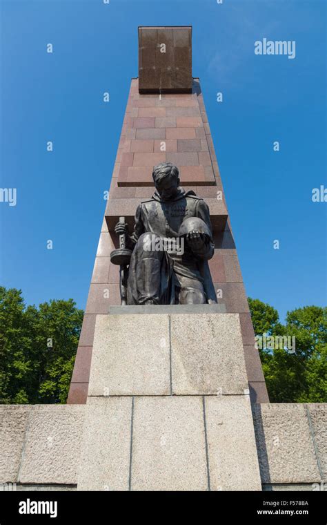 The Soviet War Memorial In Treptow Park Sculpture Of Of A Kneeling
