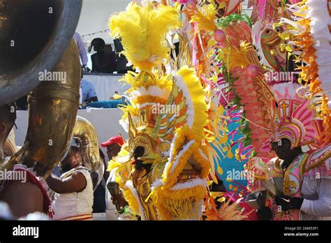 Men In Bright Colorful Costumes At The Junkanoo Street Festival Celebration In Nassau The