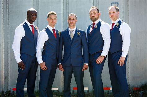 Groomsmen In Navy Suit And Vest With Marsala Ties Wedding Groomsmen