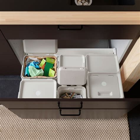 We make it easy for you to organize like a pro. HÅLLBAR Bin with lid, light grey. Find it here - IKEA