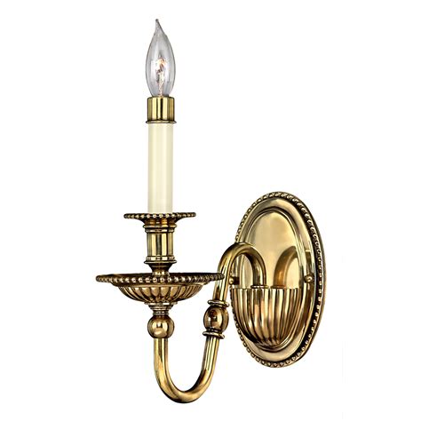 The marbles around the tea light candle keep it centred and avoid overheating the glass. Candle Style New England Solid Brass Wall Light