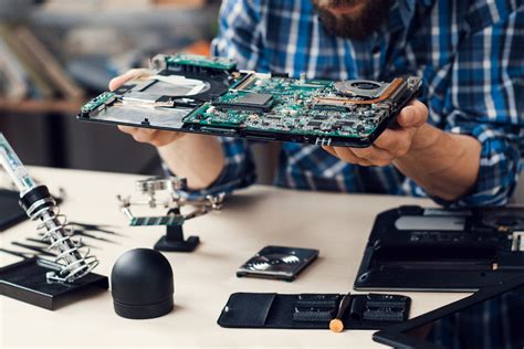 Technicians draw from their junk scrapyard to fix customers' computers at a low cost. Should You Repair Your PC or Recycle It? | Charter College