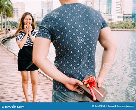 Man Surprises His Girlfriend By Giving Out A T Love And Rel Stock Image Image Of