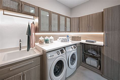 Sleek Laundry Room | Laundry room storage, Laundry room storage cabinet, Custom laundry room