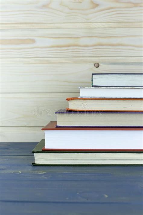 A Pile Of Books With Library On The Back Stock Photo Image Of