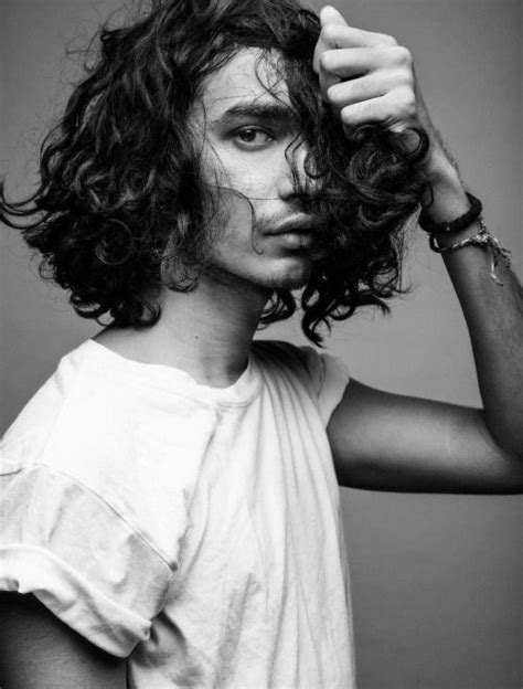 If you have curly hair, get a flat, layered cut to get a nice curly finish. Classic white T. Zippertravel | Long curly hair men, Curly ...