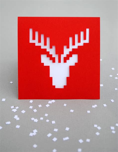 Poke holes at the center of the x using a needle or sharp object. Christmas pixel popup cards | MINI ECO